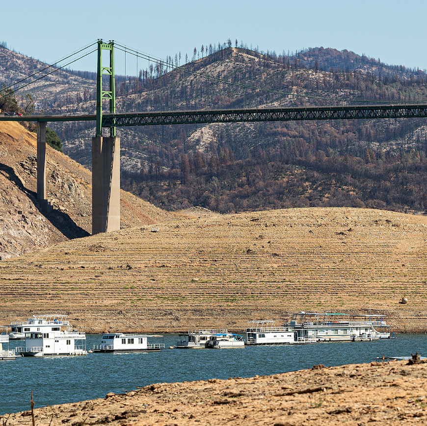 Drought Stricken Lake Oroville with low water levels and scattered boats